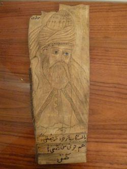 کنده کاری تصویر مولانا روی چوب